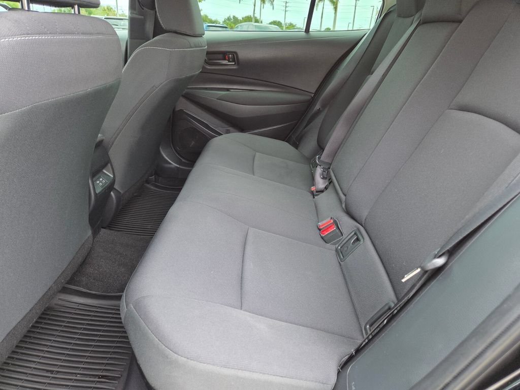 Used 2023 Midnight Black Metallic Toyota Hybrid LE image 22