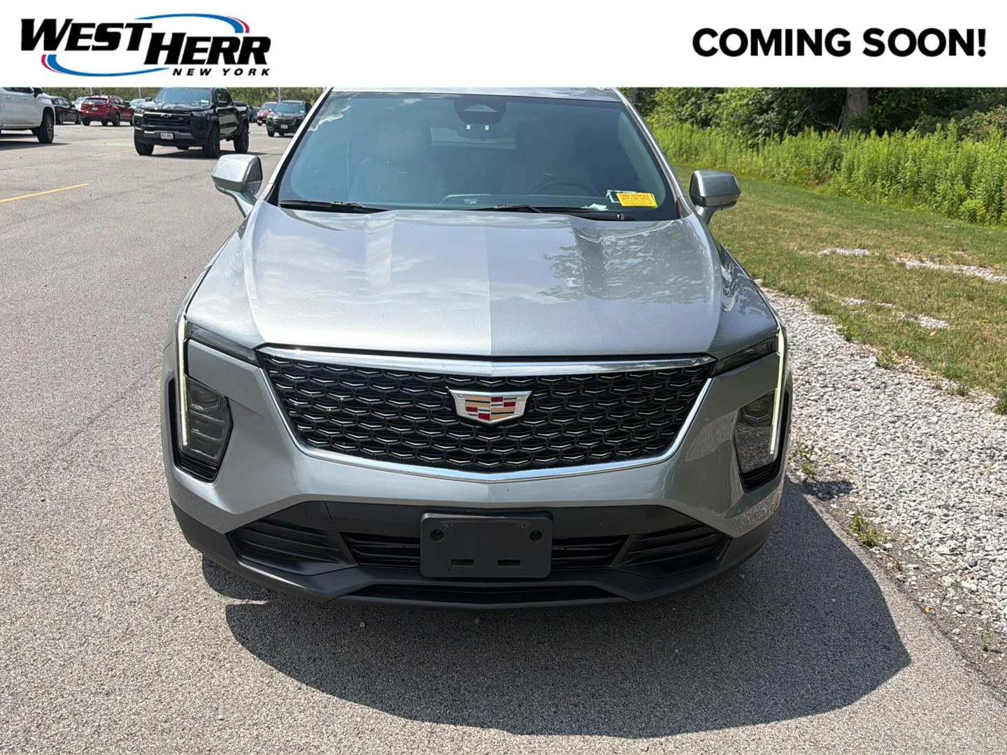 Used 2024 Argent Silver Metallic Cadillac AWD Luxury image 1