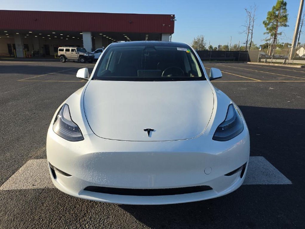 Used 2025 Tesla Model Y Long Range with VIN 7SAYGDED1SA378964 for sale in Miami, FL