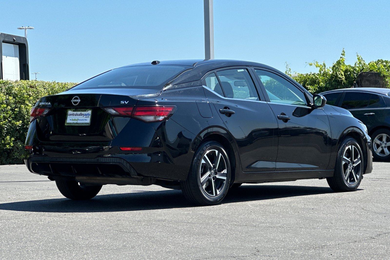 Used 2024 Super Black Nissan SV image 4