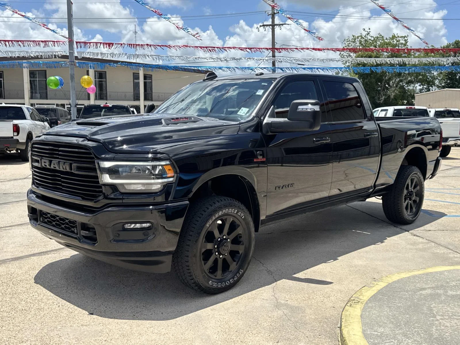 Used 2024 Diamond Black Crystal Pearlcoat Ram Laramie image 3