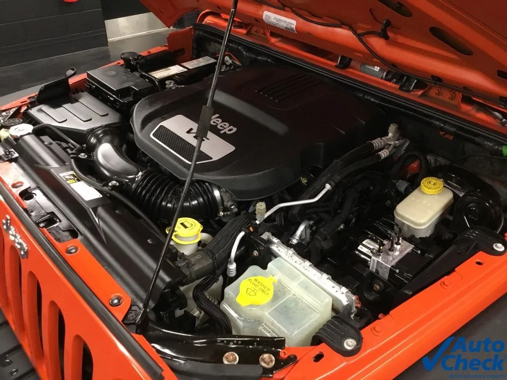 Used 2015 Orange Jeep Unlimited Sport image 45