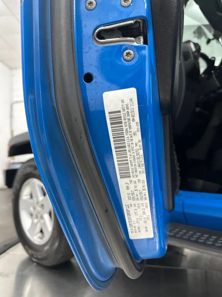 Used 2011 Blue Jeep Sport image 31