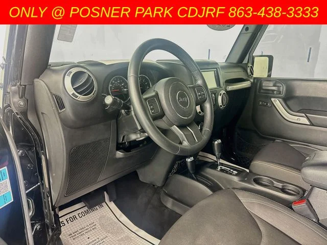 Used 2017 Black Jeep Unlimited Sahara image 9