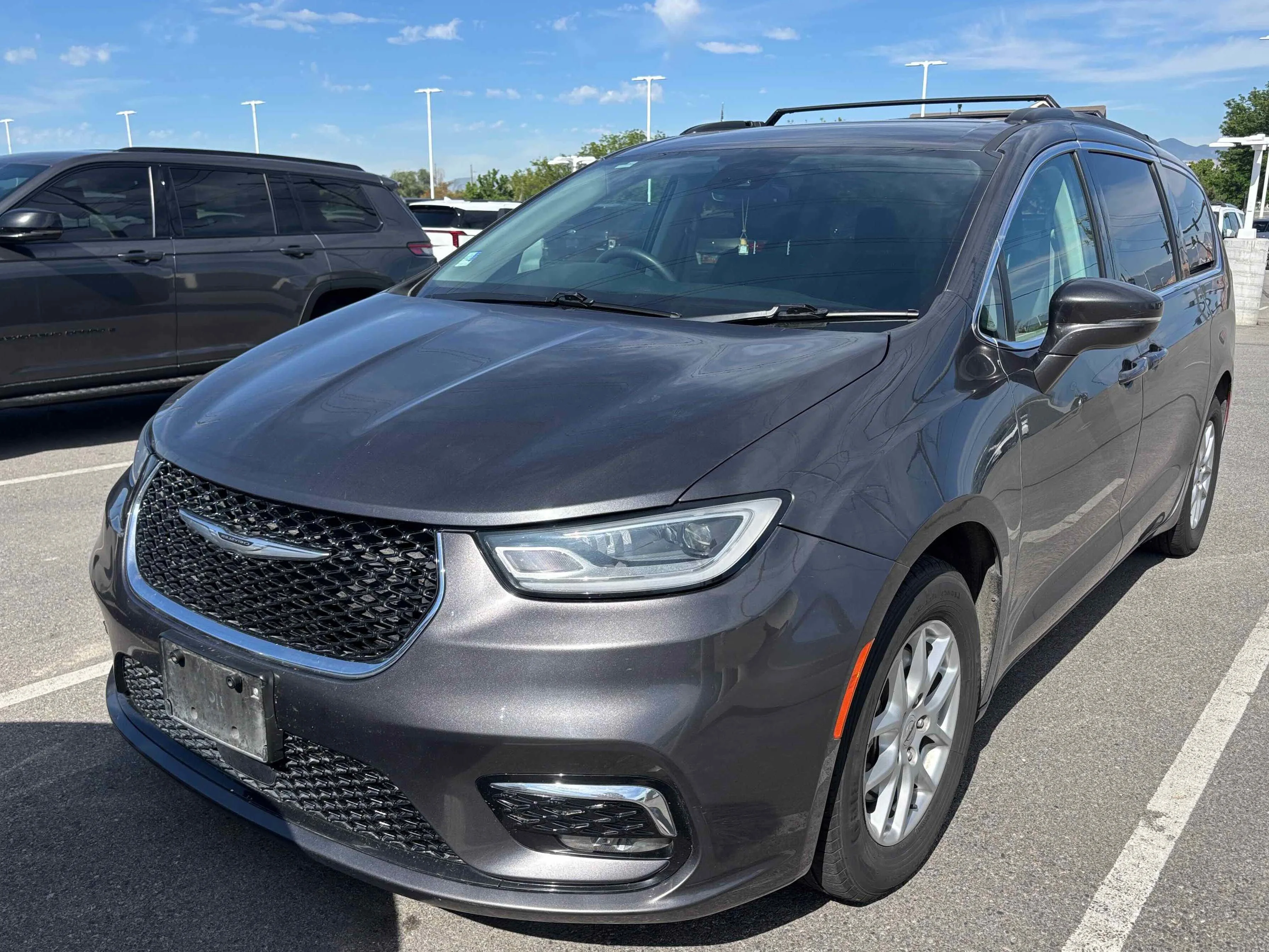 Used 2022 Granite Crystal Metallic Clearcoat Chrysler Touring L image 1