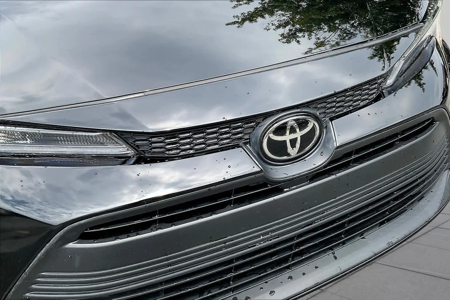 Used 2024 Midnight Black Metallic Toyota LE image 29