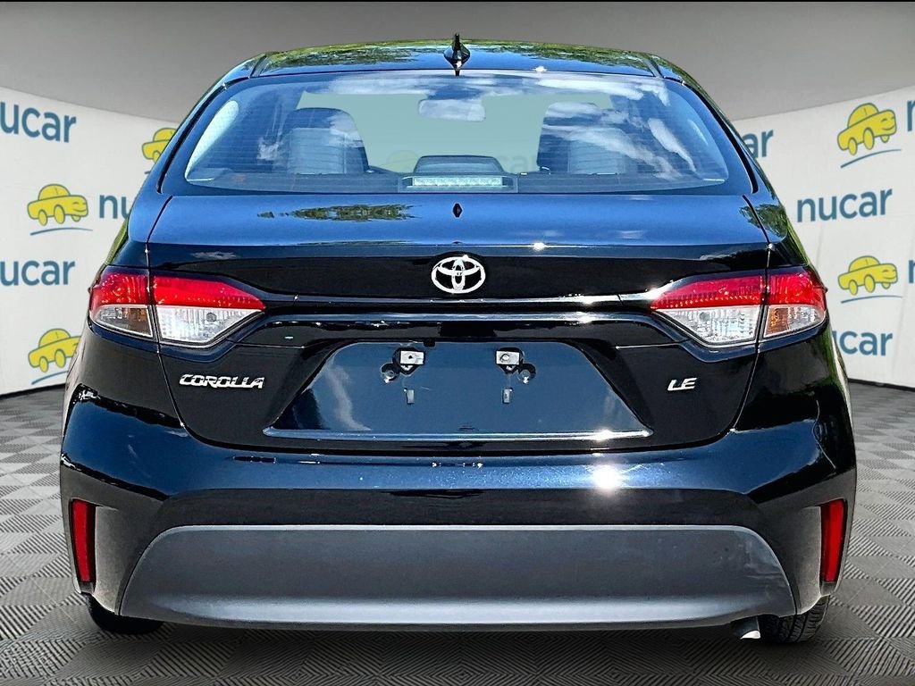 Used 2024 Black Toyota LE image 5