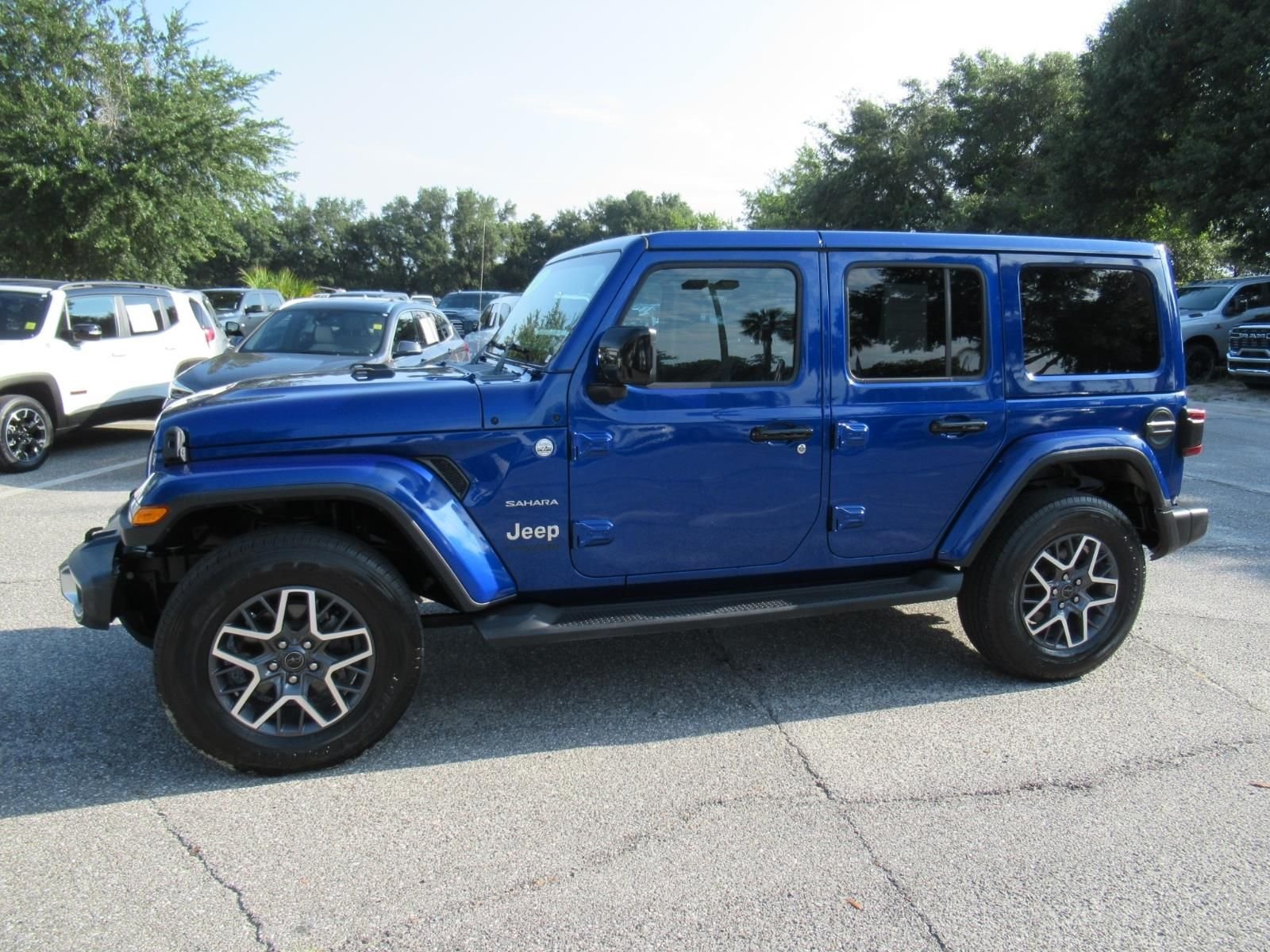 Used 2018 Blue Jeep Unlimited Sahara image 4