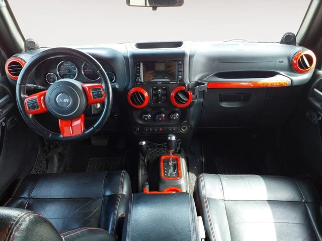 Used 2012 Black Jeep Unlimited Sahara Altitude image 10