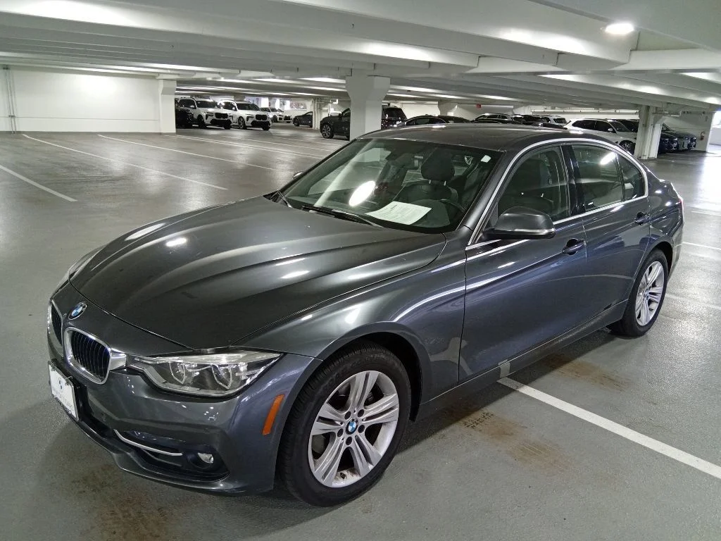 Used 2017 Mineral Gray Metallic BMW 330i xDrive image 1