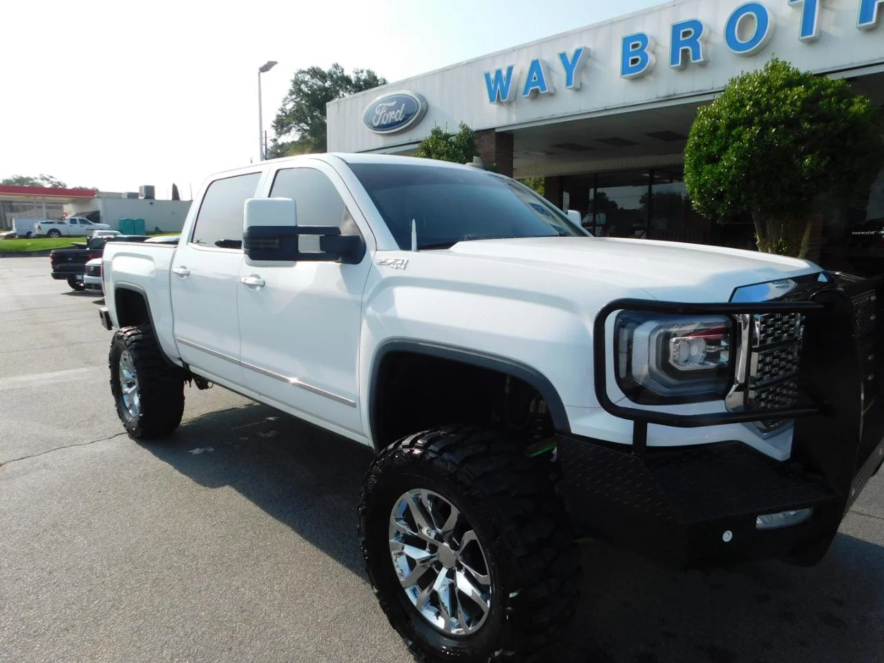 Used 2016 White GMC 4WD Crew Cab 143.5 in SLT image 2