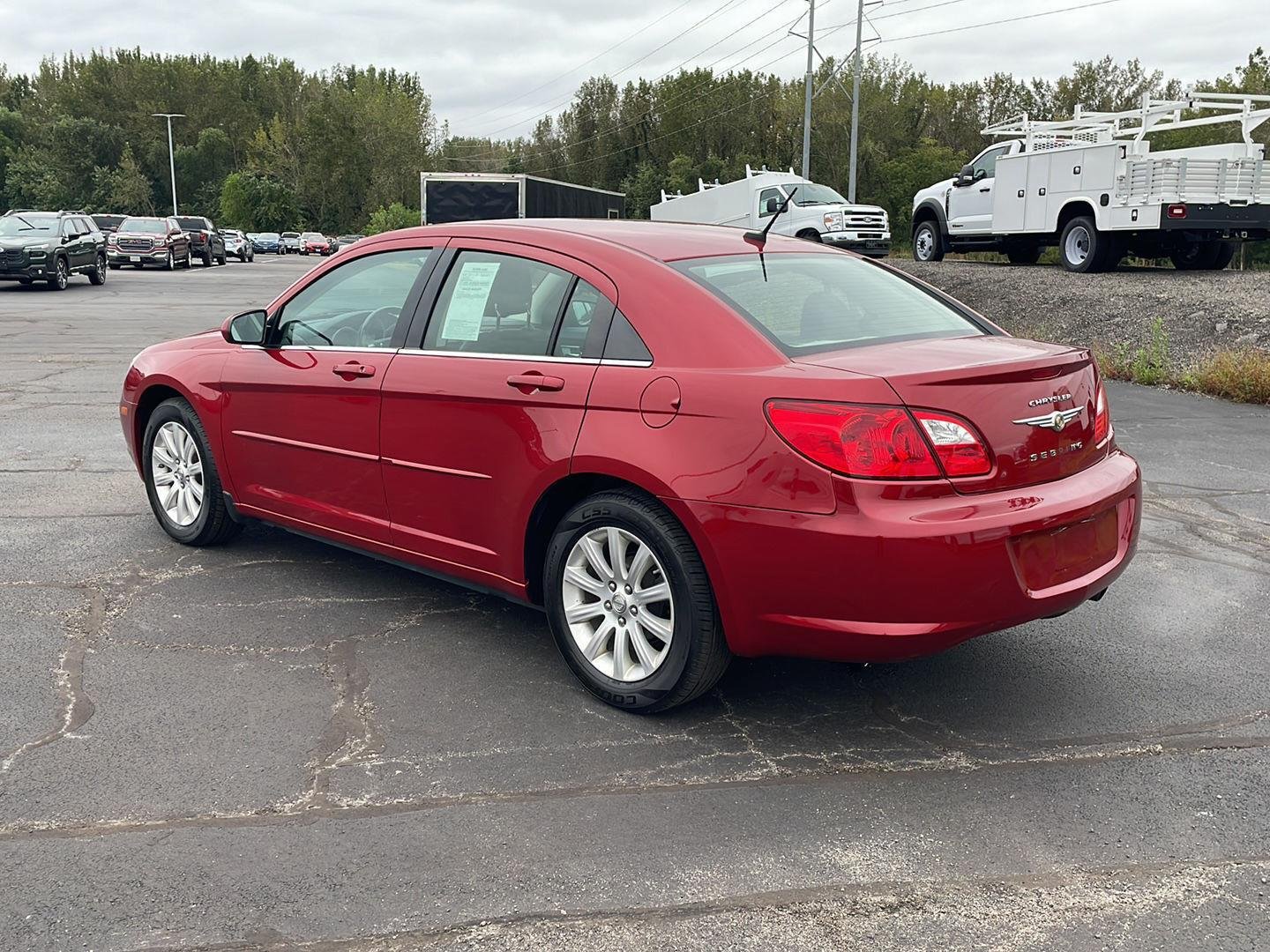 Used 2010 Inferno Red Crystal Pearl Chrysler Limited image 3