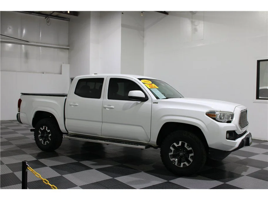 Used 2016 White Toyota SR5 Pickup 4D 5 ft image 1