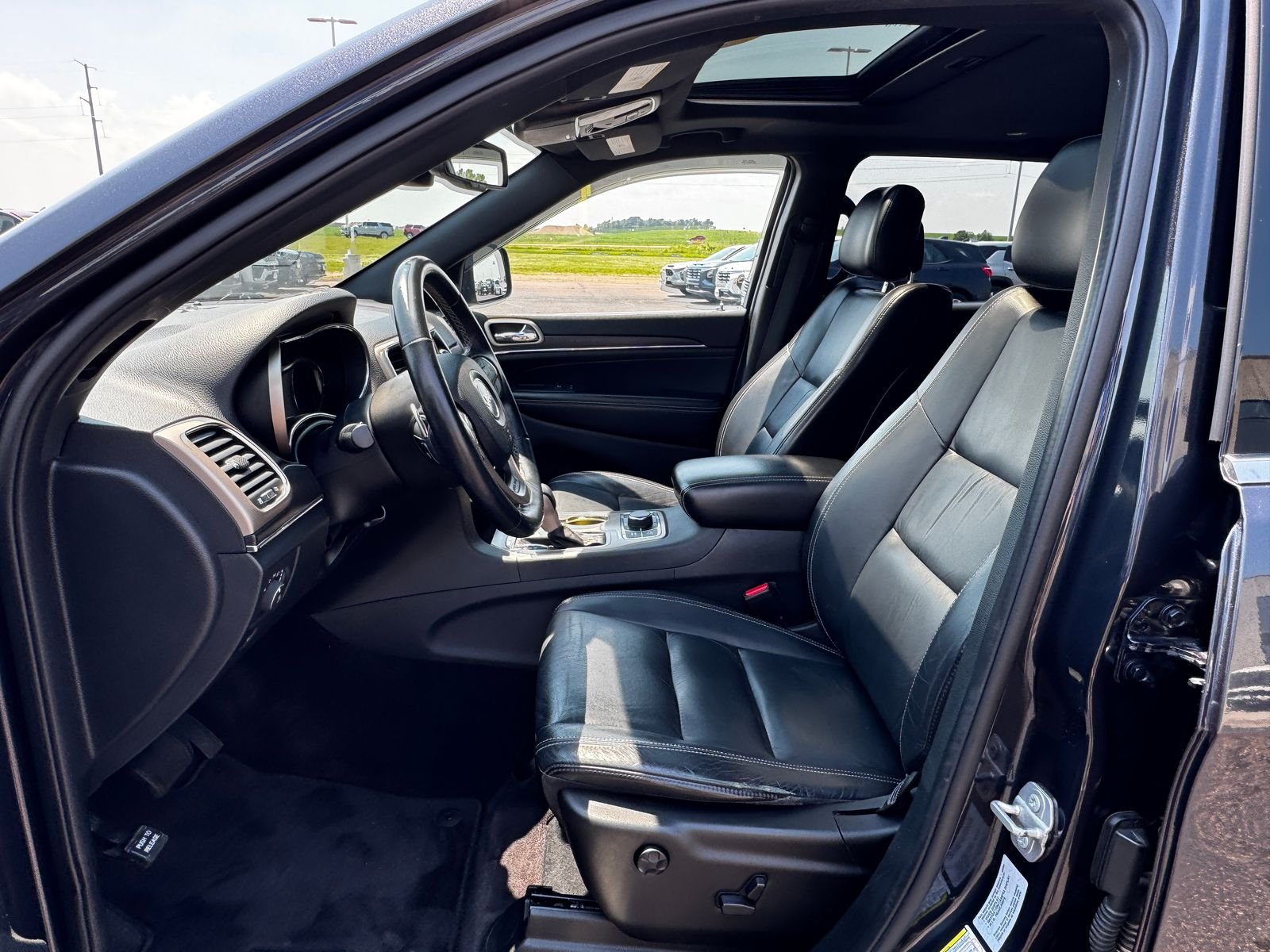 Used 2016 Steel Metallic JEEP Limited image 13