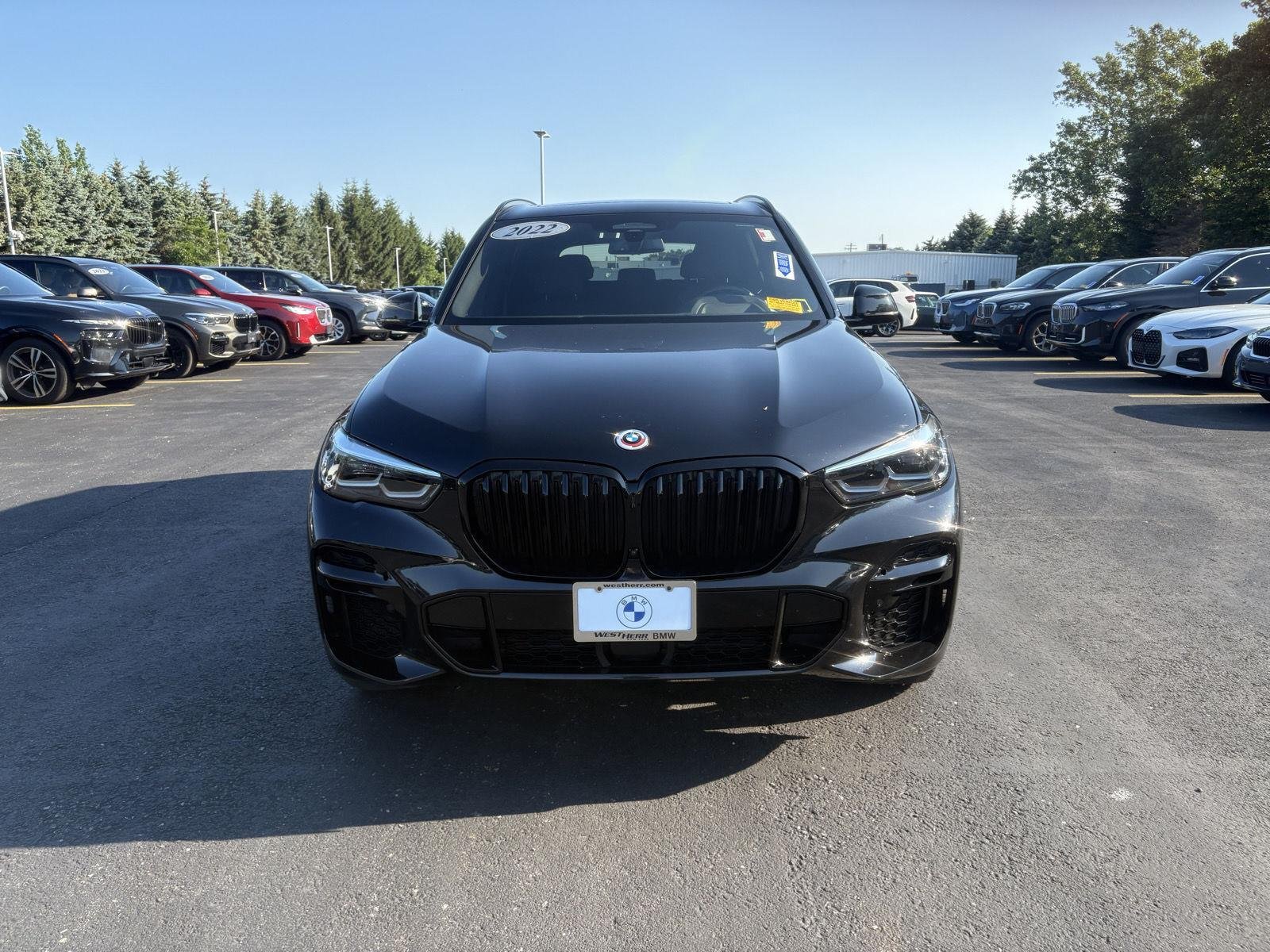 Used 2022 Black Sapphire Metallic BMW M50i image 2