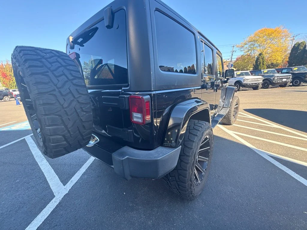 Used 2018 Black Jeep Unlimited Sahara image 7