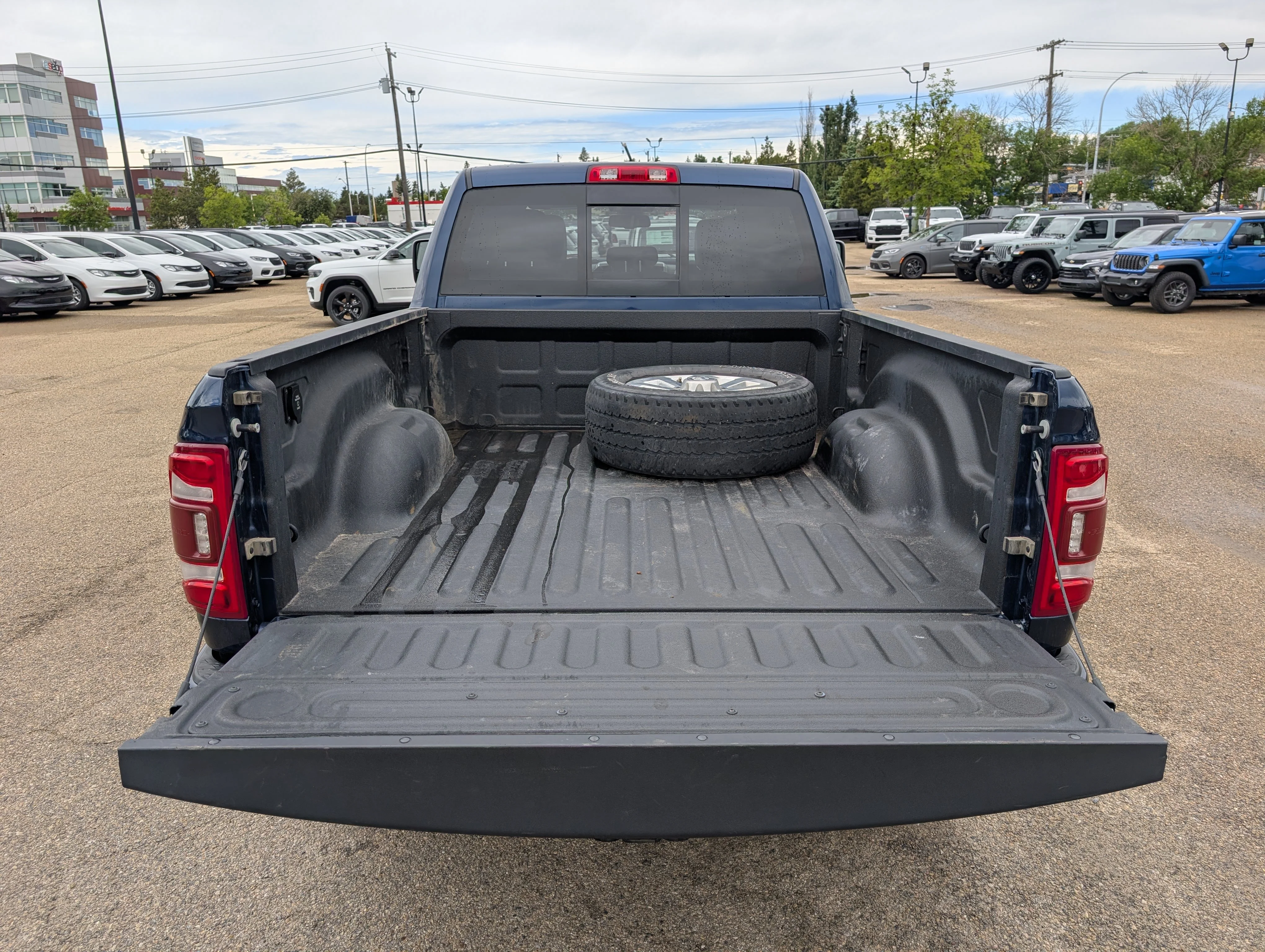 Used 2023 Patriot Blue Pearl Ram Laramie image 6