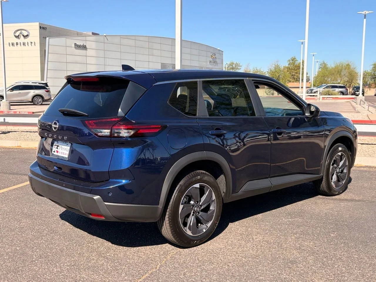 Used 2025 Deep Ocean Blue Pearl Nissan SV image 7