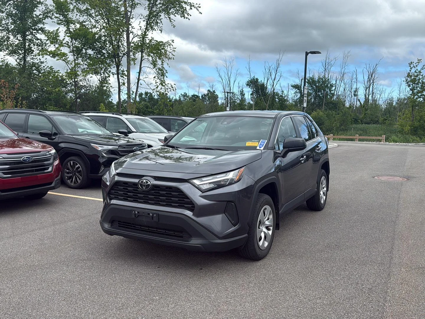 Used 2024 Magnetic Gray Metallic Toyota LE image 4
