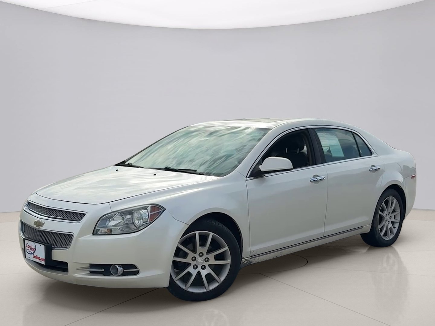 Used 2012 White Chevrolet 1LTZ image 1