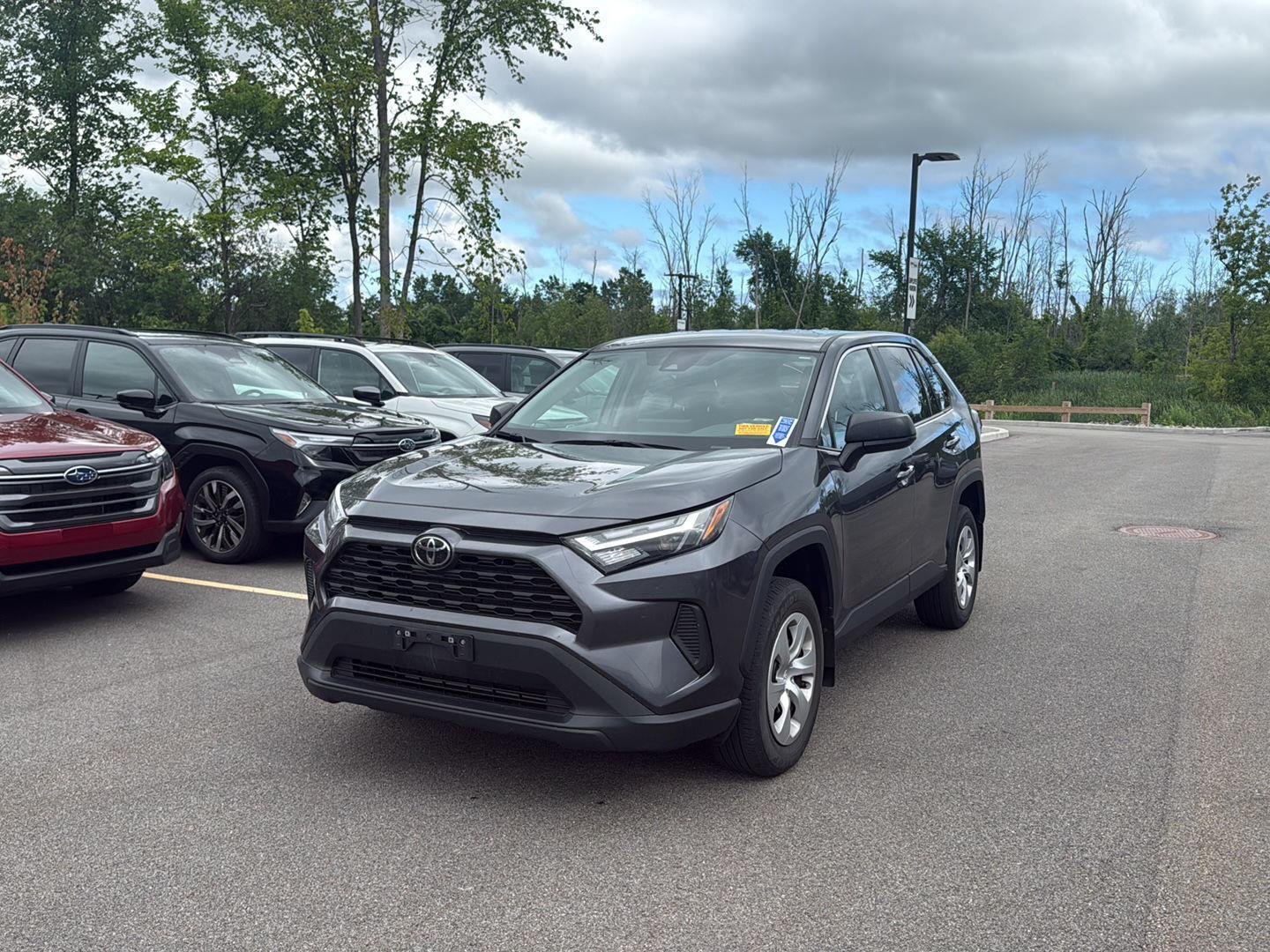 Used 2024 Magnetic Gray Metallic Toyota LE image 4
