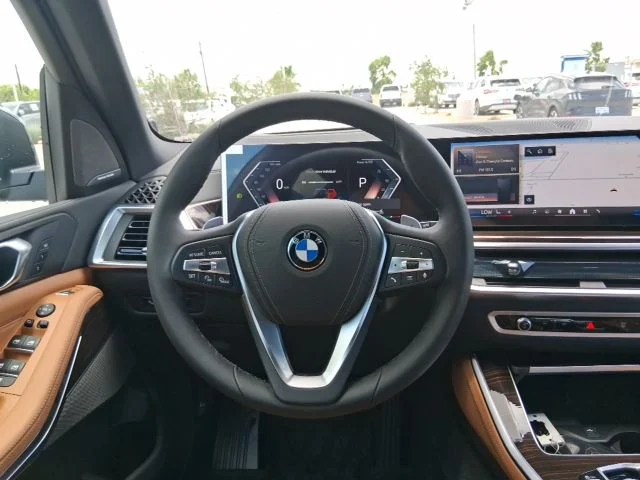 New 2026 Black Sapphire Metallic BMW sDrive40i image 9