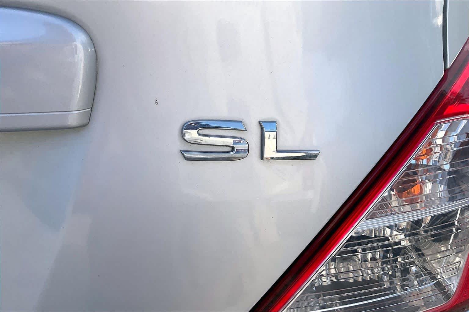 Pre-Owned 2012 Nissan Versa SL