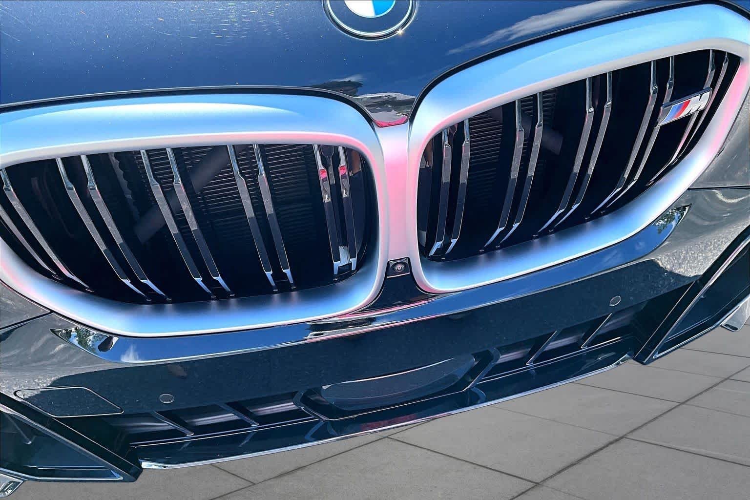 Used 2026 Black Sapphire Metallic BMW M60i image 30