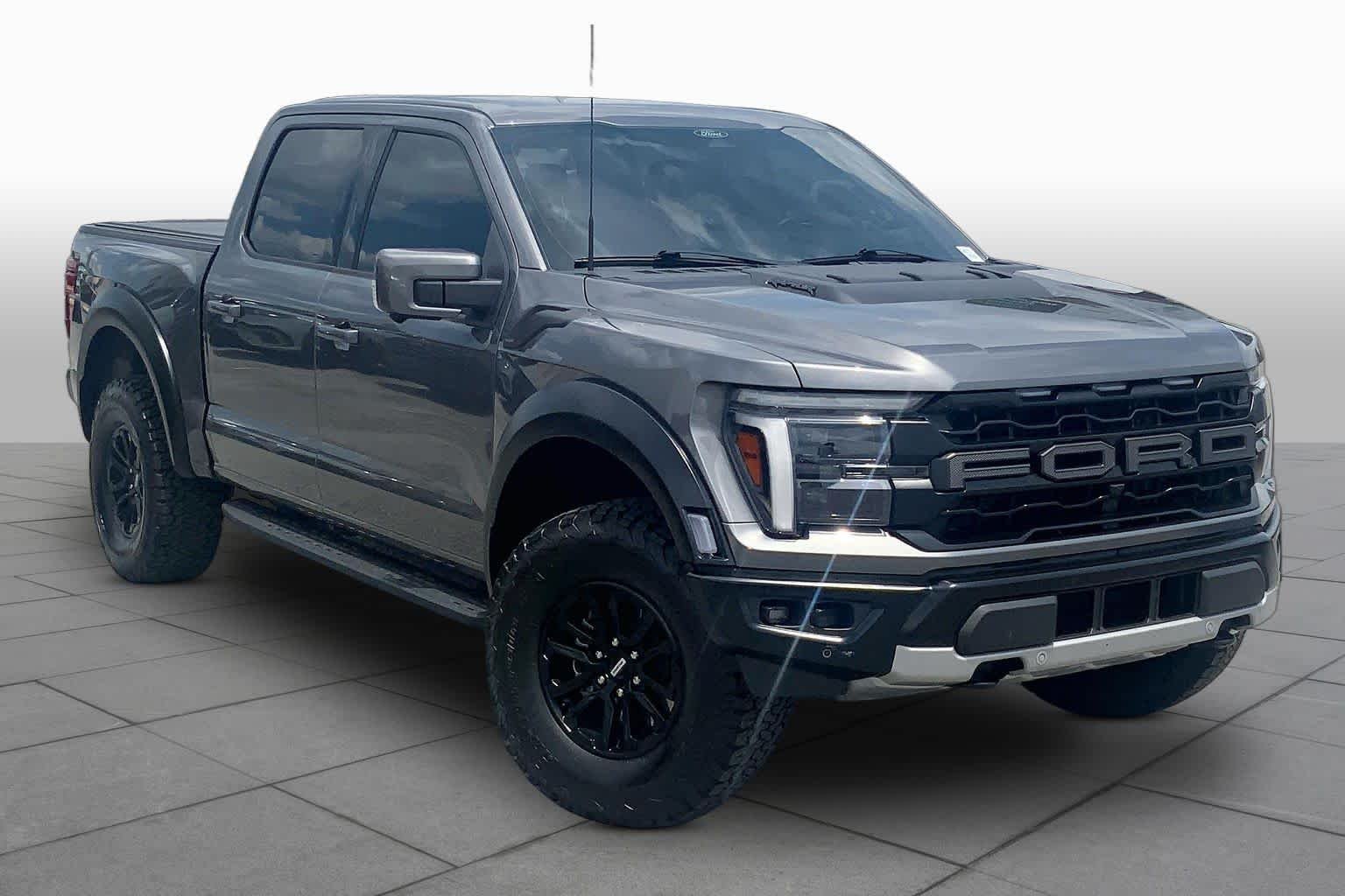 Used 2025 Carbonized Gray Ford Raptor image 3