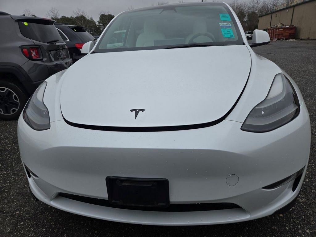 Used 2023 Tesla Model Y Long Range with VIN 7SAYGDEE9PF639048 for sale in Akron, OH
