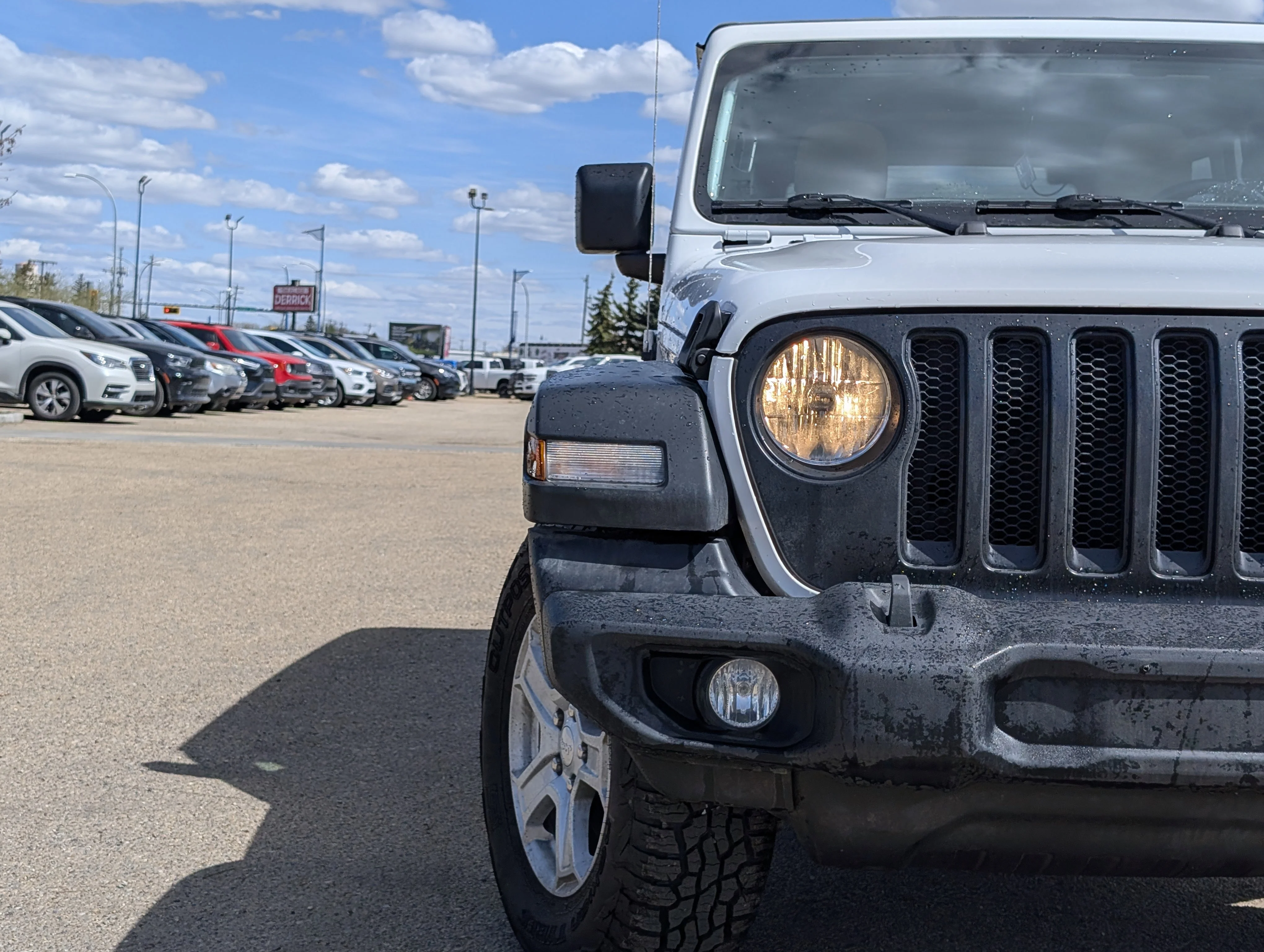 Used 2021 Bright White Jeep Unlimited Sport image 11