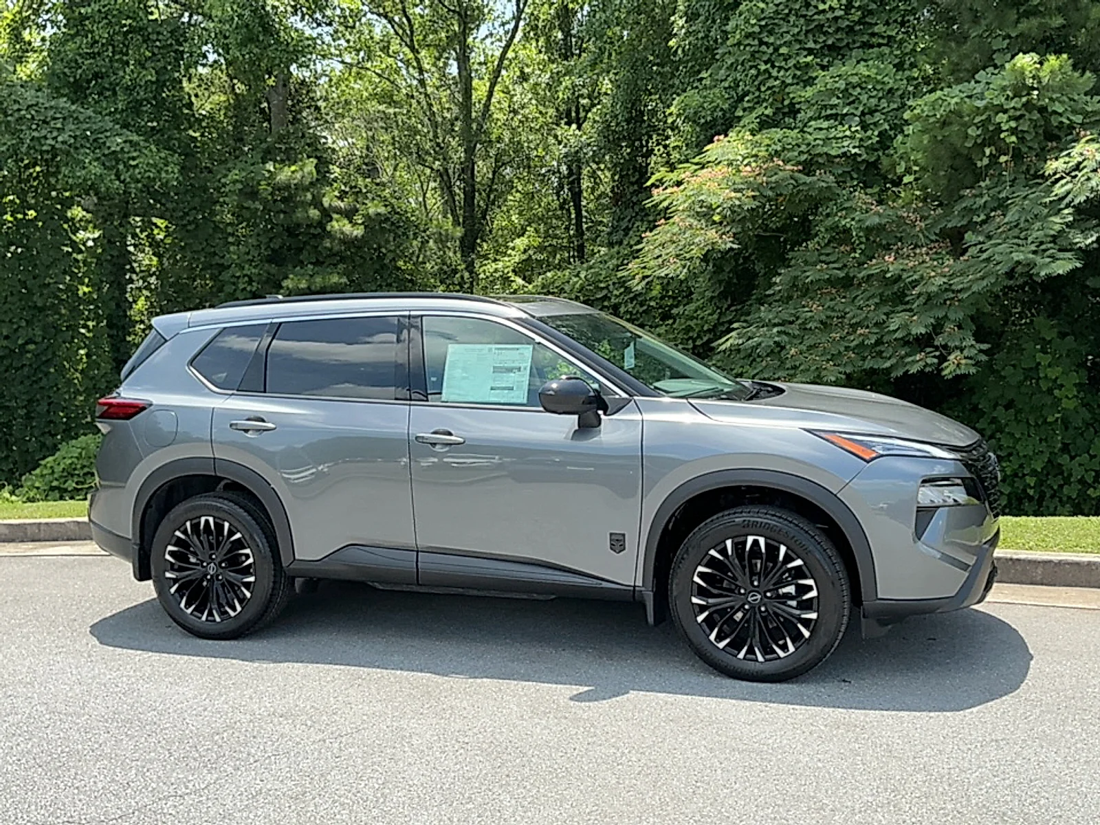 New 2026 Gun Metallic Nissan Dark Armor image 1