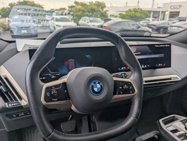 Certified Used 2024 Aventurin Red Metallic BMW xDrive50 image 16