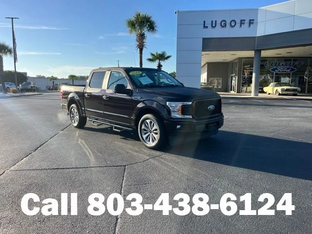 Used 2018 Magma Red Metallic Ford XL image 1