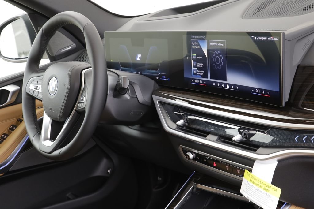 New 2026 Black Sapphire Metallic BMW xDrive50e image 24