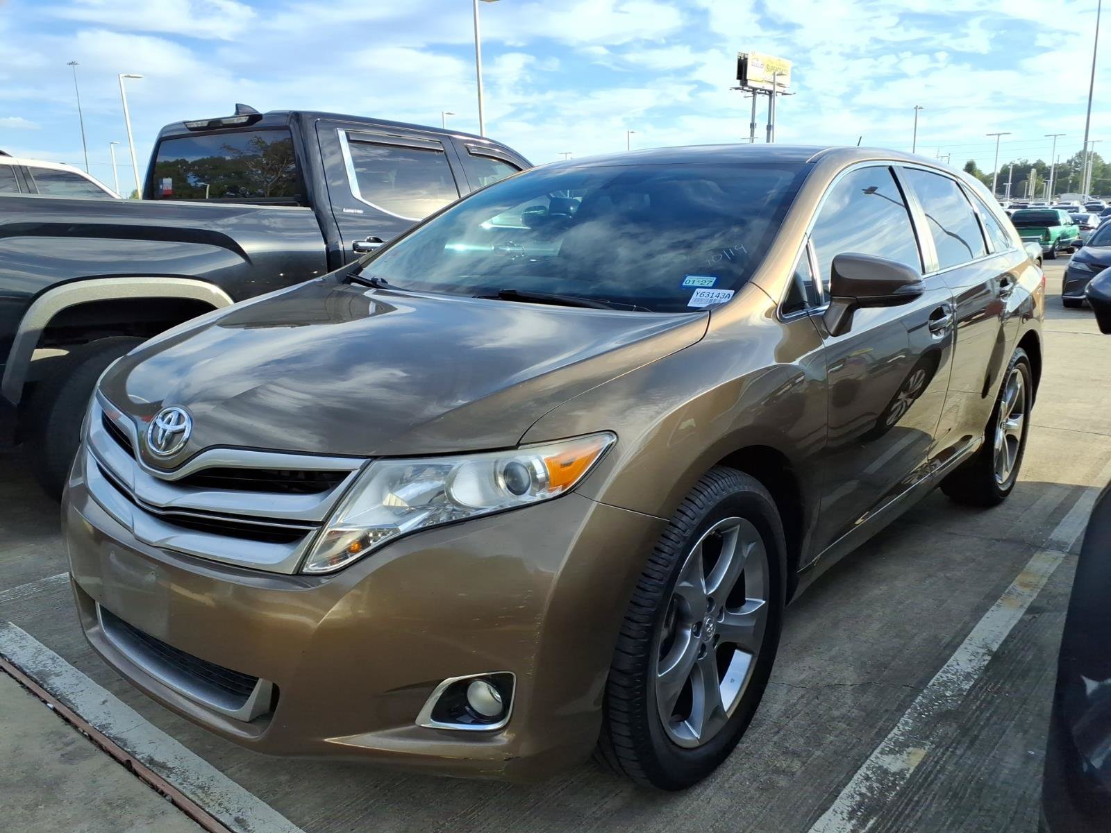 Used 2013 Golden Toyota LE image 4
