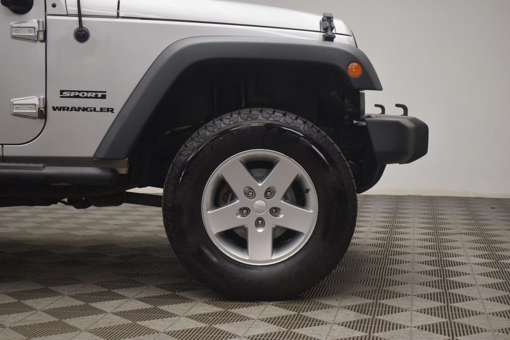 Used 2012 Bright Silver Metallic Clearcoat Jeep Sport image 20