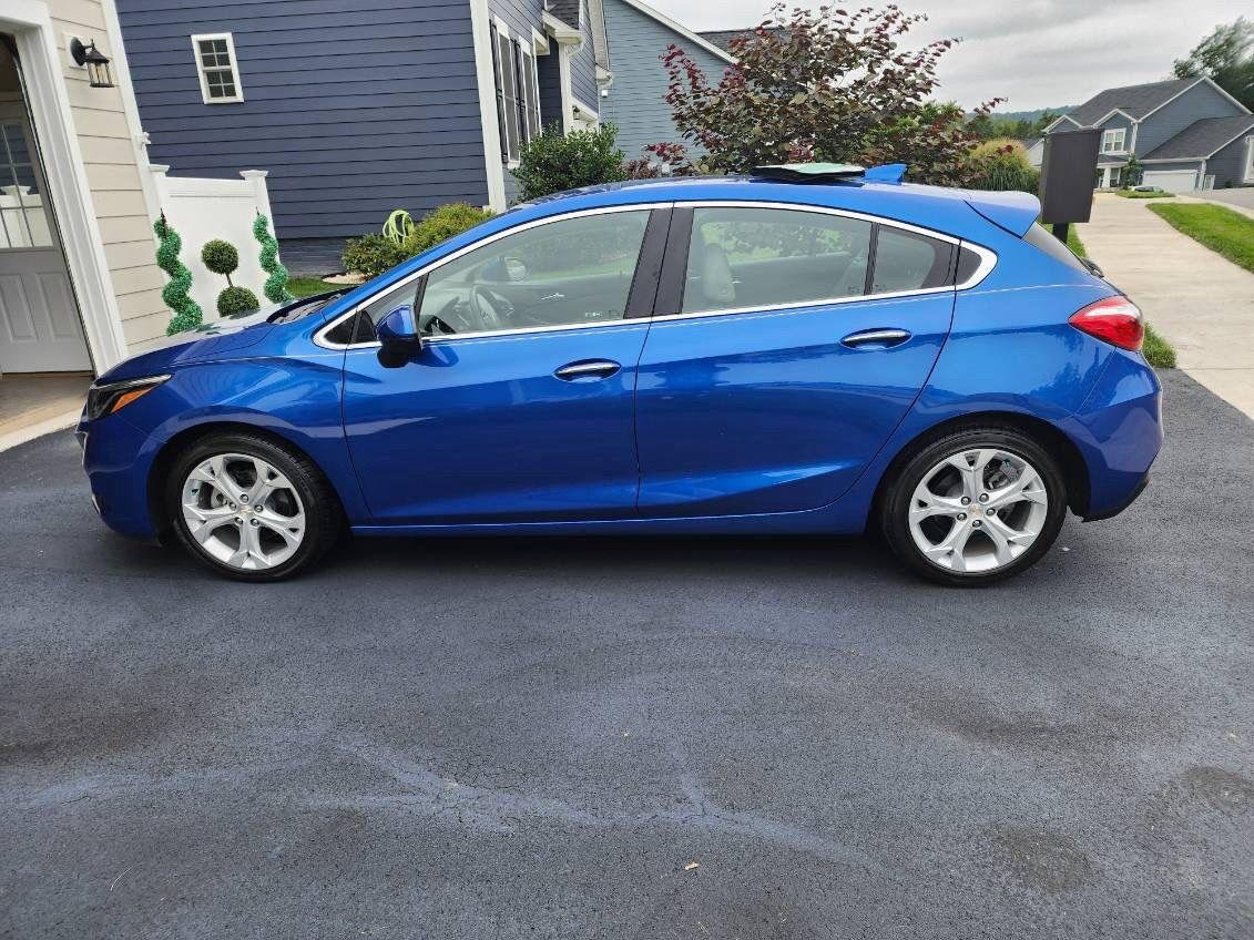 Used 2017 Kinetic Blue Metallic Chevrolet Premier image 1