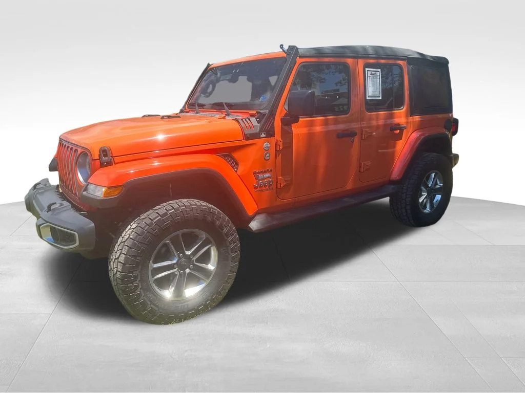 Used 2018 Orange Jeep Unlimited Sahara image 4