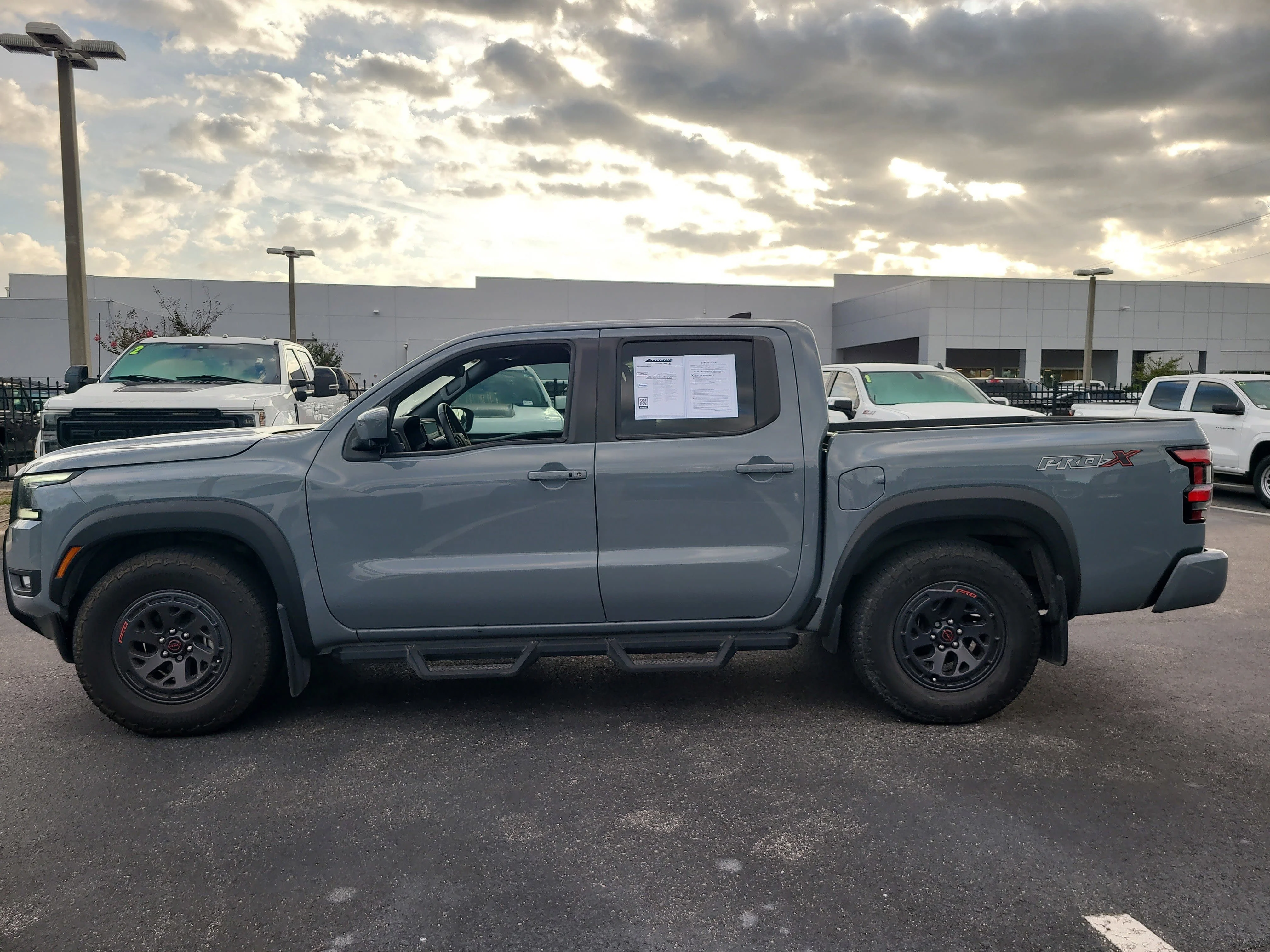 Used 2025 Boulder Gray Pearl Nissan PRO-X image 7