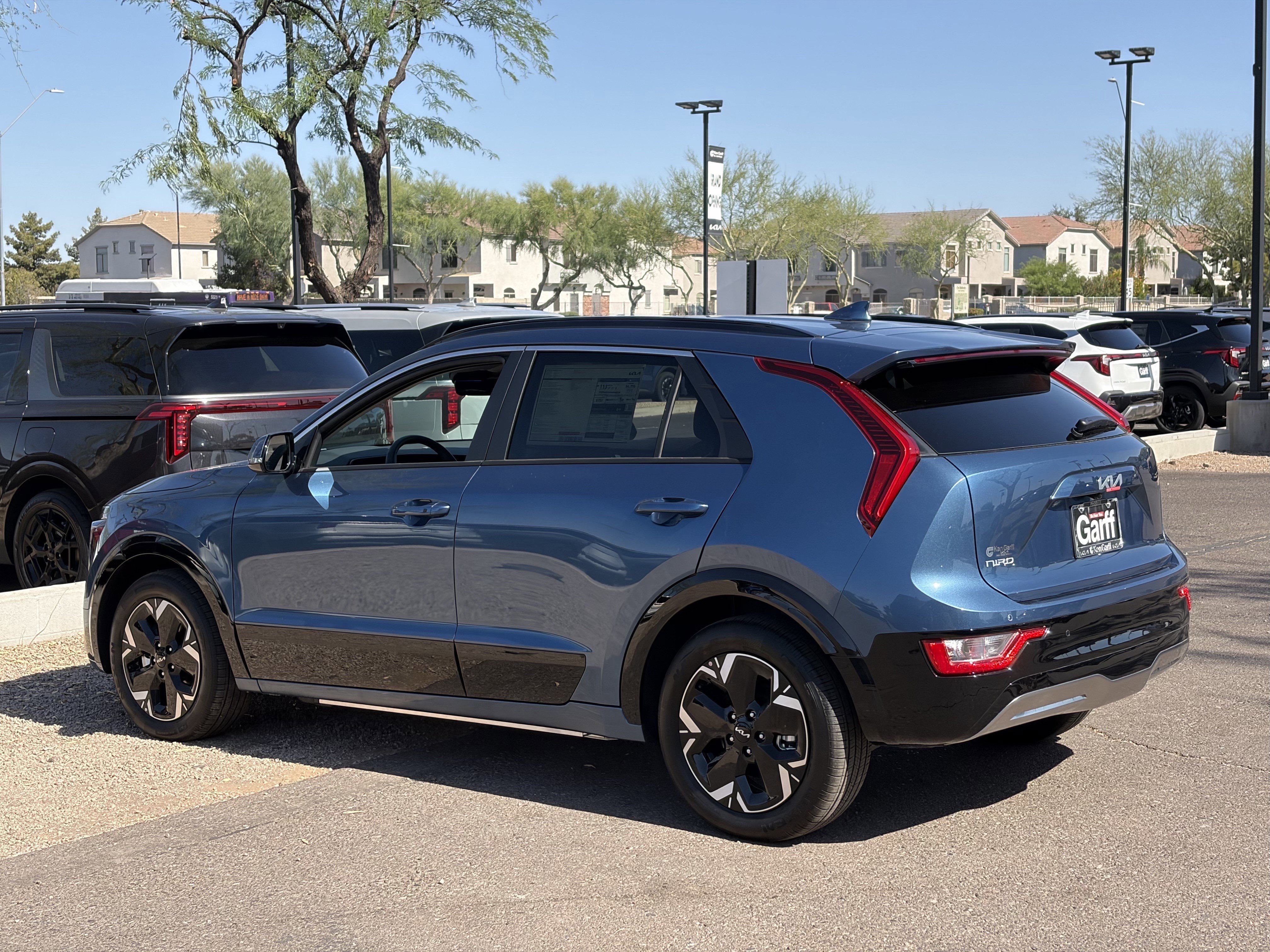 New 2026 Mineral Blue Kia WIND image 3
