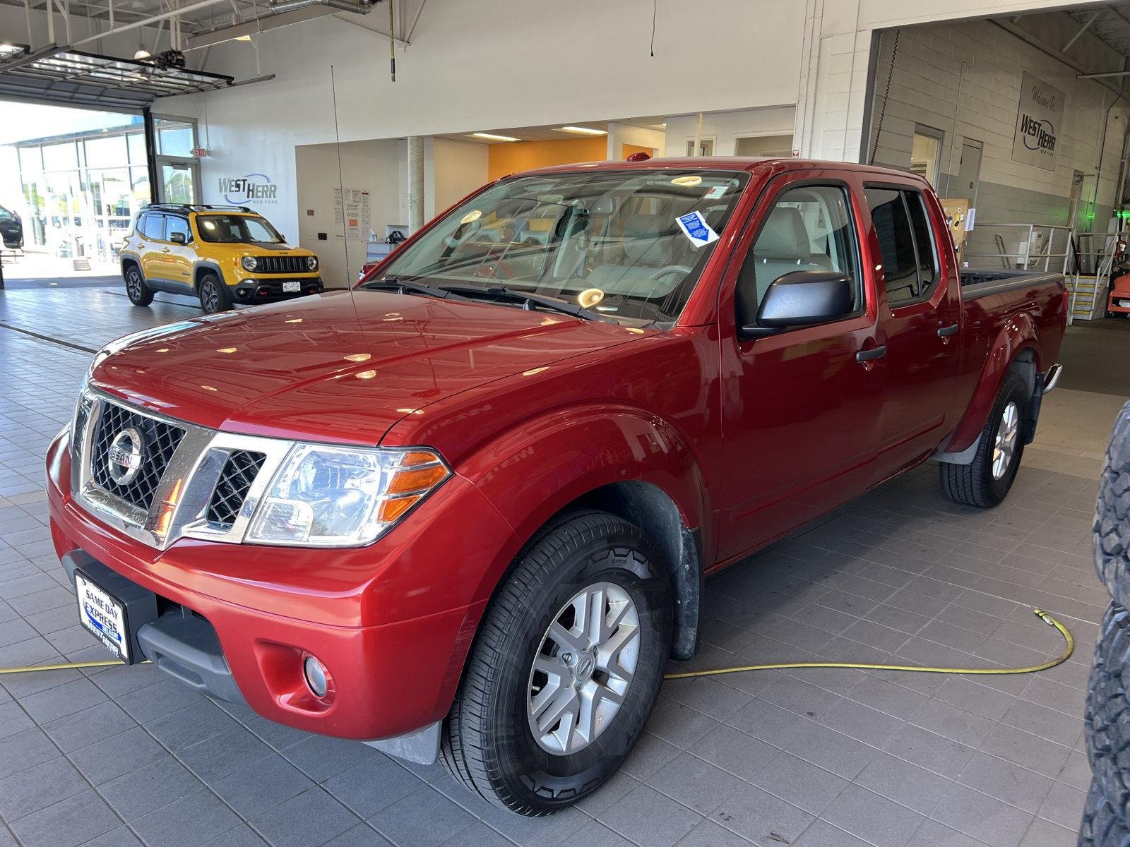 Used 2016 Lava Red Nissan SV image 4