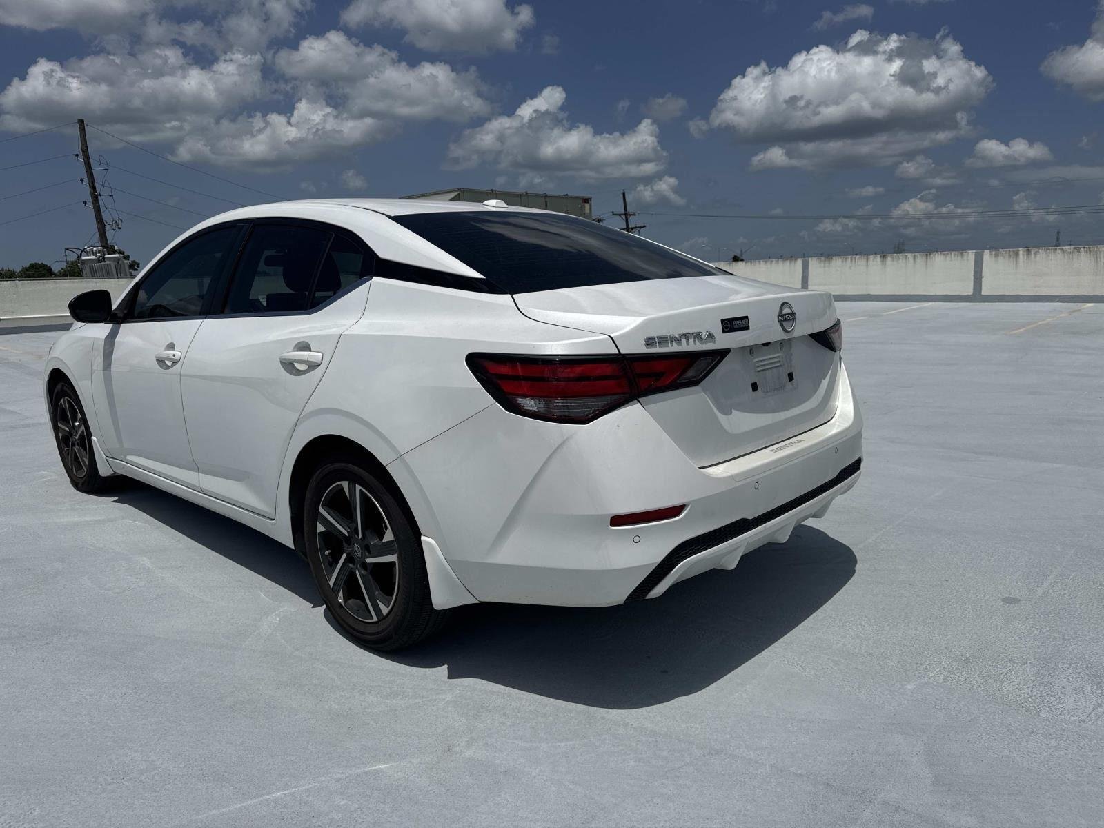 Used 2025 Aspen White Tricoat Nissan SV image 4