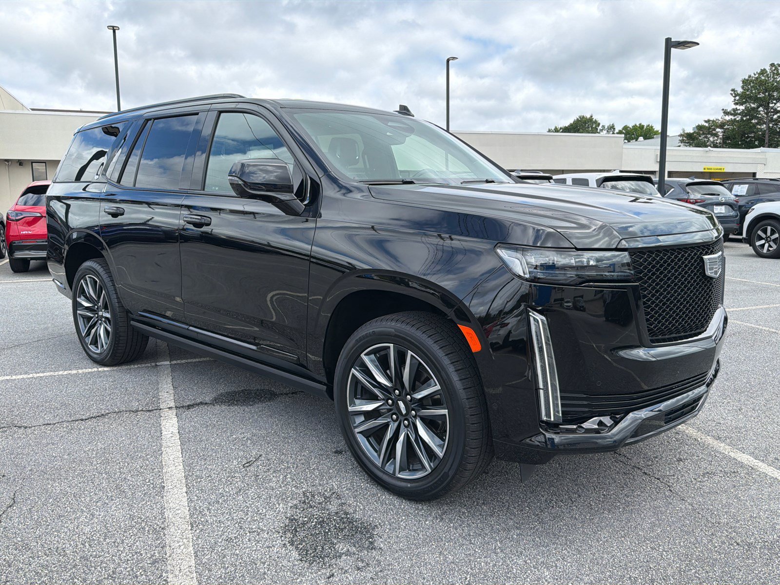 Used 2021 Black Raven Cadillac Sport image 1