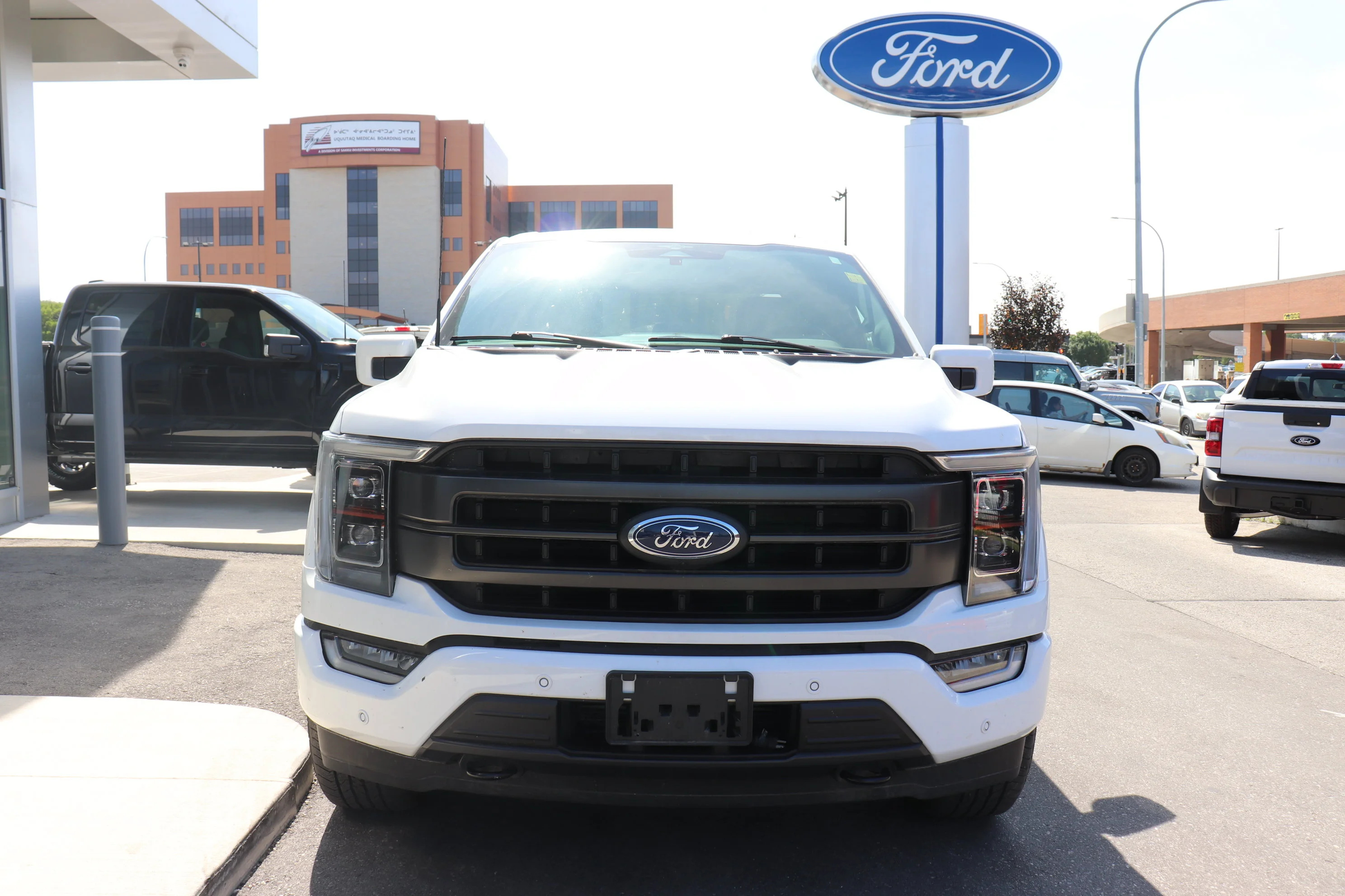 Certified Used 2023 Silver Ford Lariat 4WD SuperCrew 5.5