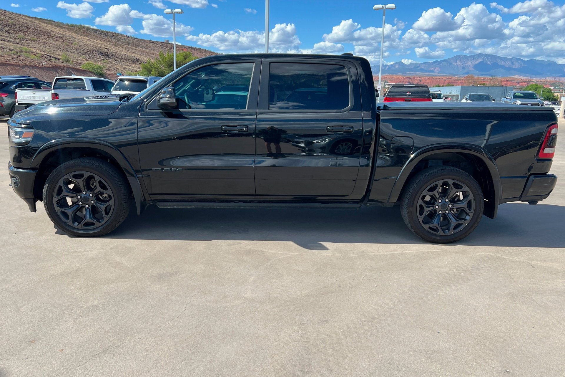 Used 2024 Diamond Black Crystal Pearlcoat Ram Limited image 2