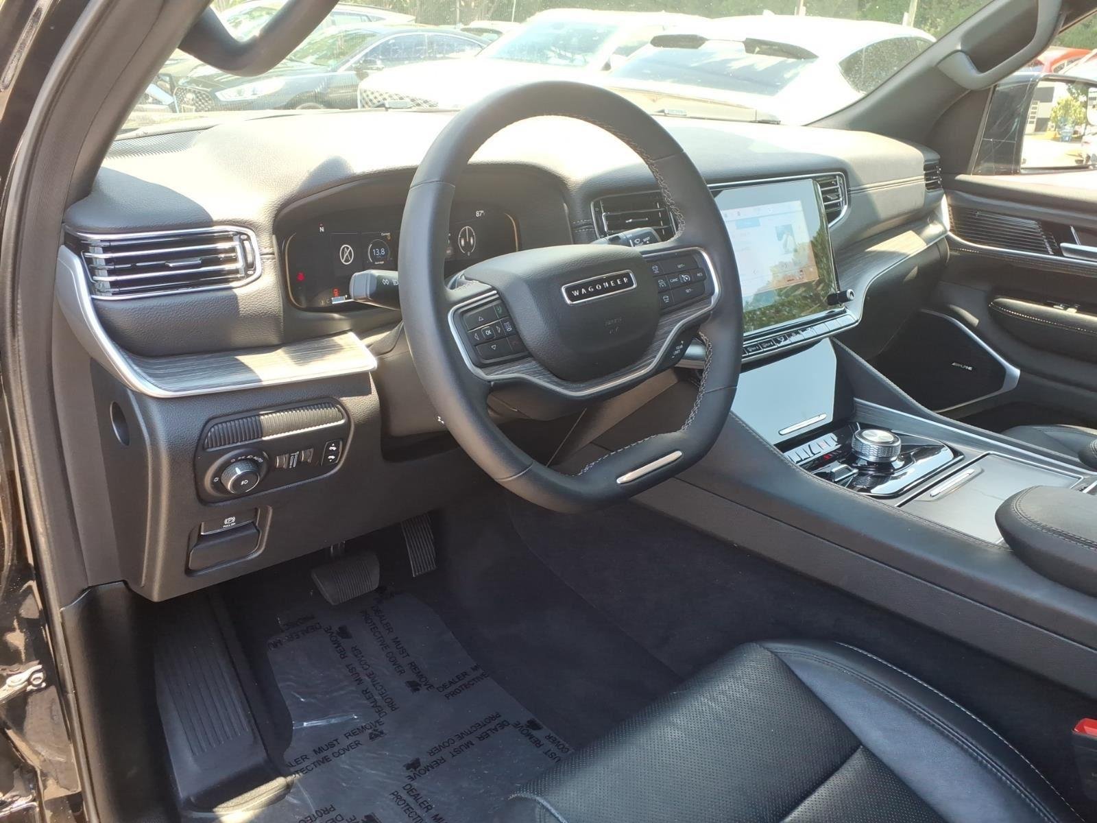 Used 2024 Diamond Black Crystal Pearlcoat Jeep Series II image 24