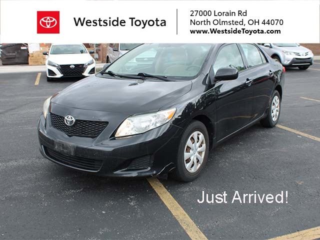 Used 2010 Black Sand Pearl Toyota LE image 1