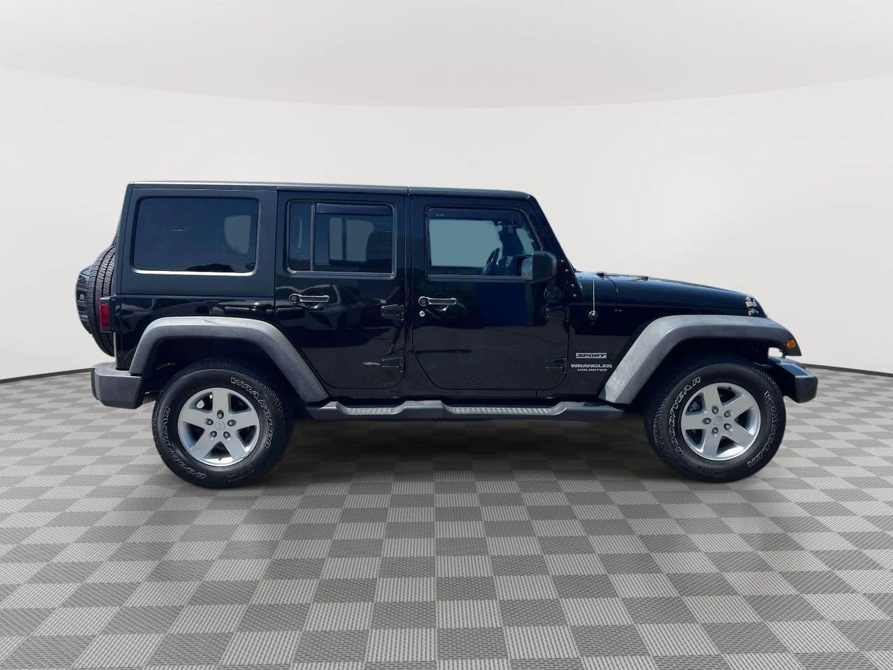 Used 2015 Black Clearcoat Jeep Sport image 4