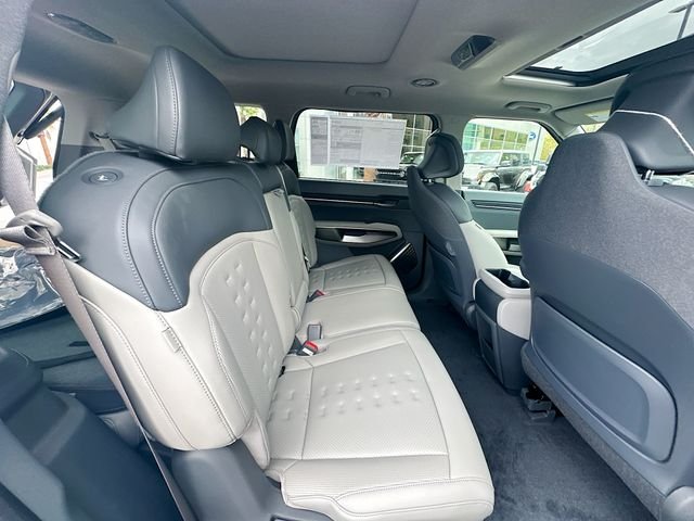 New 2026 Ivory Silver Kia Wind AWD image 29